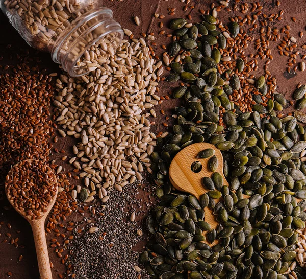 stock image Different types of grains and seeds on shabby wooden