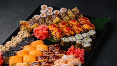 Sushi set on the black plate