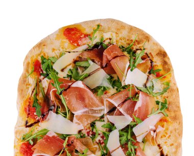 Fresh pizza Parma made of parmesan, prosciutto ham and arugula