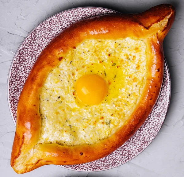 stock image Georgian cuisine ajaruli khachapuri - georgian bread with egg and cottage cheese