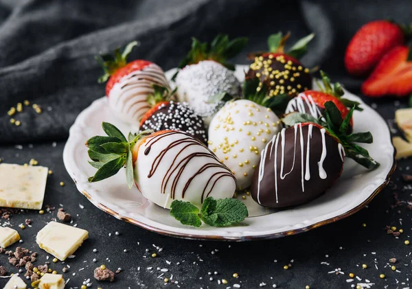 Strawberries Glazed Black White Chocolate Lie White Plate — Stock Fotó