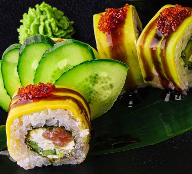 Green dragon sushi roll with eel, avocado, cucumber