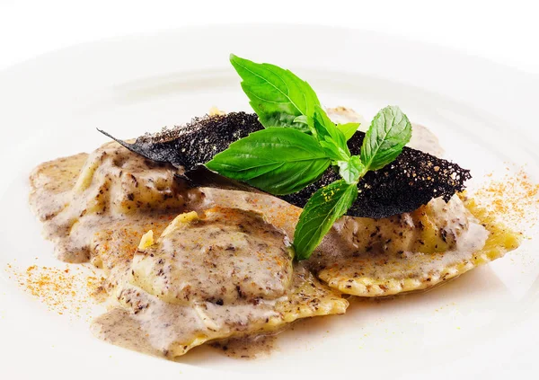 stock image Ravioli in creamy truffle sauce on plate