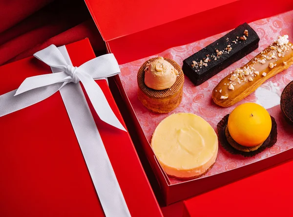 different french pastries in a christmas box