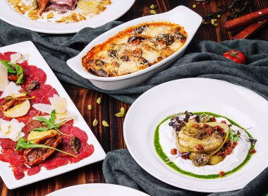 Carpaccio di manzo, Melanzane, Melanzana alla ricotta, Tar-tar ve somon ve Vitello tonnato.