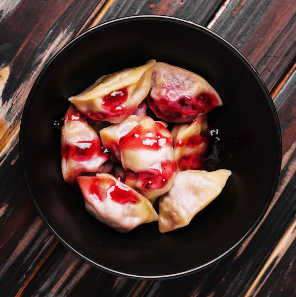 Dumplings Stuffed Cherry Black Plate — Stock Photo, Image