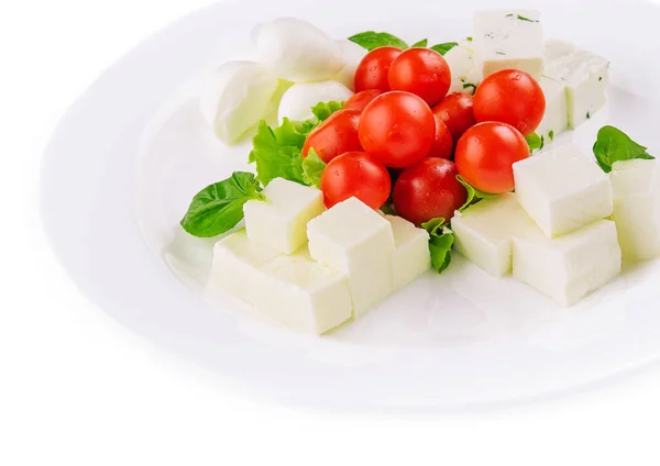 stock image Mozzarella cheese with cherry tomatoes and goat cheese