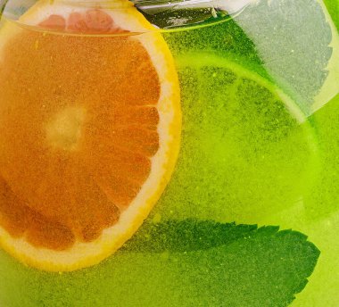 refreshing tea with lime and orange and mint