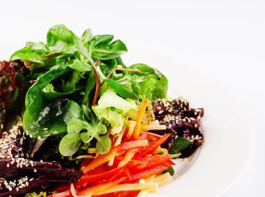 Slice fresh vegetables on the white plate