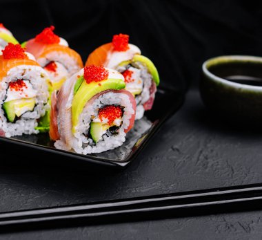 sushi rolls of red tuna with salmon