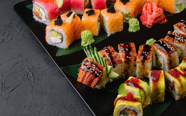 Sushi set on the black plate