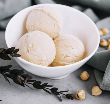Delicious ice cream with hazelnut close up