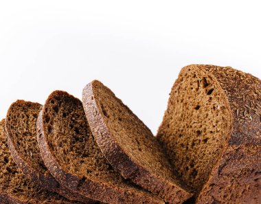 Cut loaf of rye bread isolated on white
