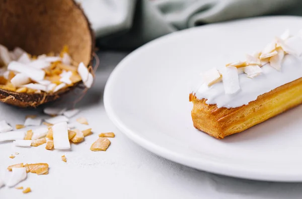 French Eclair Coconut Plate — стоковое фото