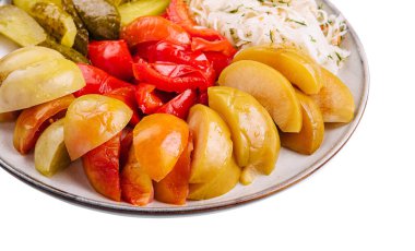 mixed pickles on a white plate