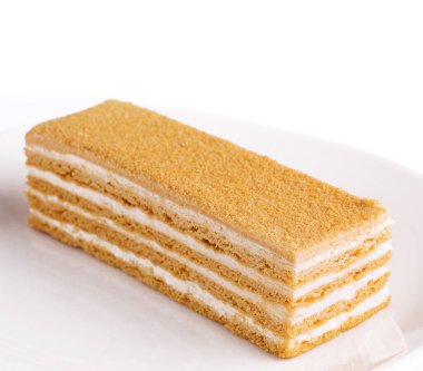 Napoleon slice cake of puff pastry with cream