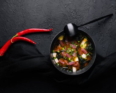 Japanese miso soup with fresh tuna, dried seaweed, tofu