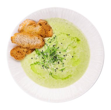 Bowl of tasty mushroom cream soup and bread