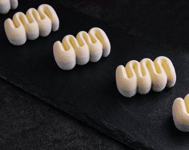 Contemporary Three Chocolates Mousse Cakes on stone