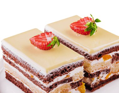 two pieces multi-layered cocoa sponge cake