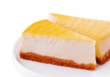 two slices of lemon cheesecake on a plate