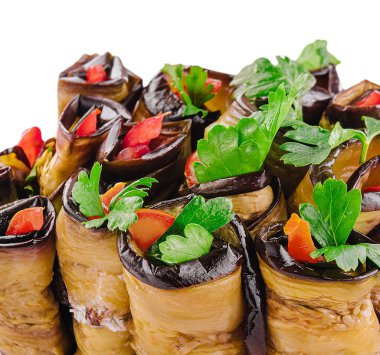 Rolls of fried eggplant stuffed with mayonnaise and tomatoes
