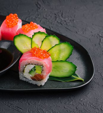 Sushi roll Maguro with tuna and red caviar