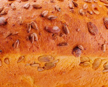 Freshly baked wheat and rye bread with seeds