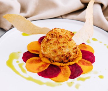 breaded cutlet with sweet potato and beets