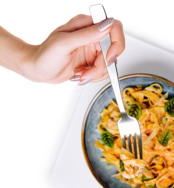 Italian spaghetti on fork close up