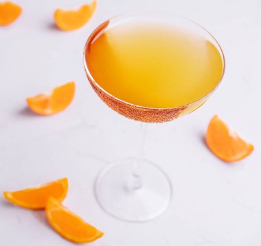 Glass of sidecar orange cocktail top view