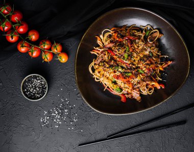 Japanese udon, soba with beef on black bowl