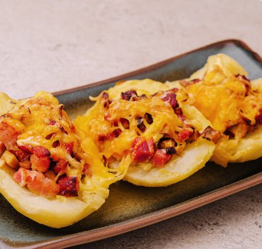 Baked stuffed bell peppers filled with bacon