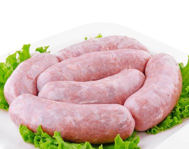 Fresh raw pork bratwurst isolated on a white background