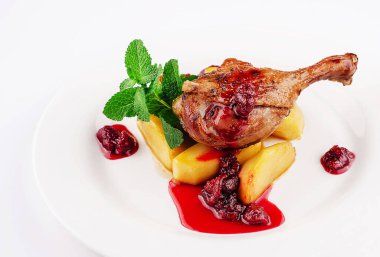 duck leg with potatoes and raspberry jam