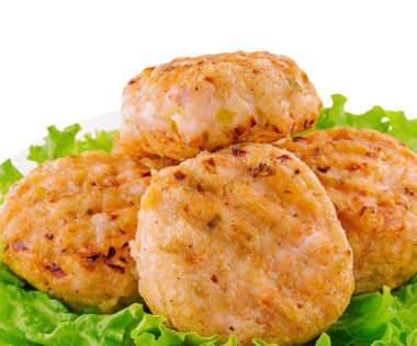 Fish cutlets with carrots on a plate