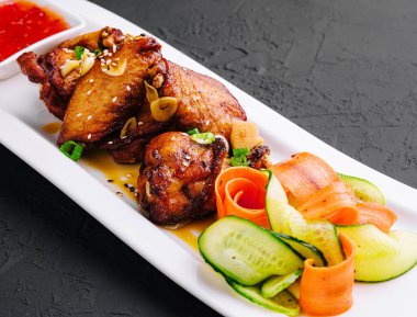 Fried chicken with sweet and sour sauce with vegetables