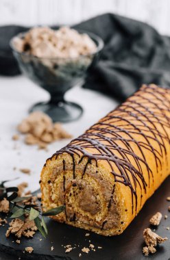 dessert roll with halva on a plate