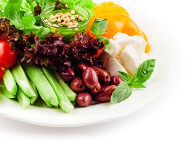 chopped tomatoes, cucumbers, peppers and mozzarella