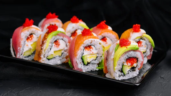 sushi rolls of red tuna with salmon