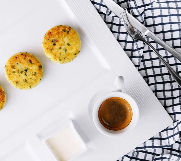 Traditional breakfast with coffee and cheesecakes, cottage cheese pancakes