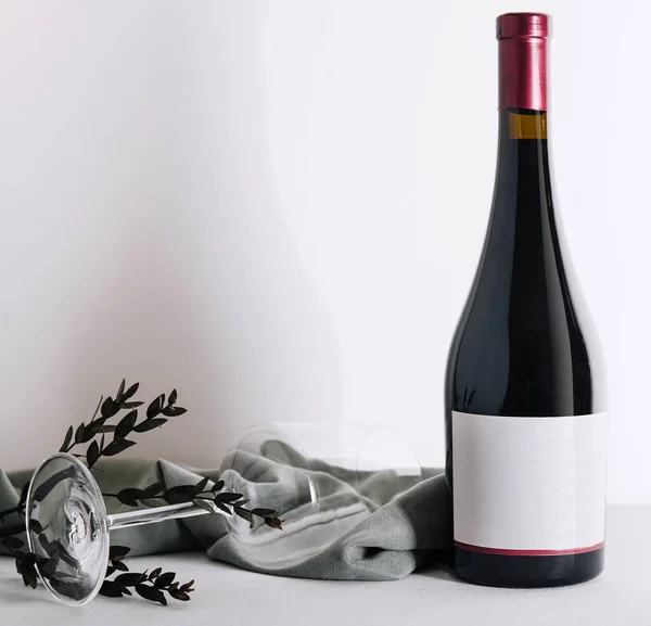 Glass Bottle Wine Light Background — стоковое фото