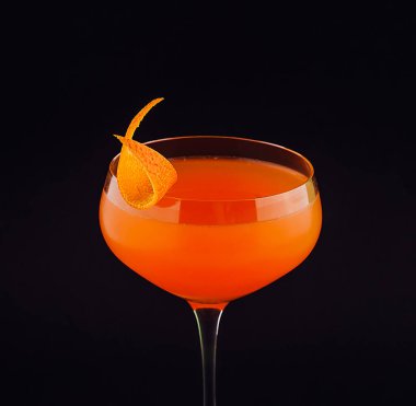 Fresh orange alcoholic drink with orange peel