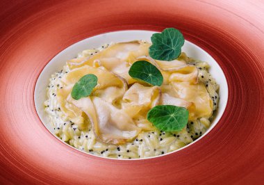 white fish fillet served with steamed rice in a beautiful red bowl