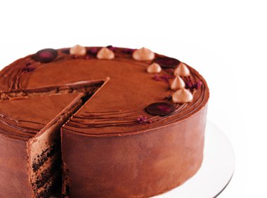 Chocolate coffee cake on white plate