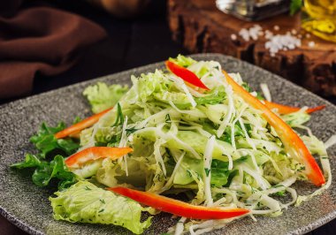 Fresh salad with fresh vegetables on plate
