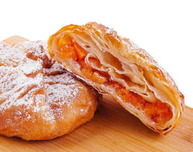 sweet pumpkin buns on wooden board