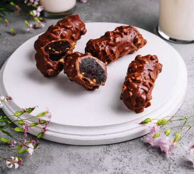 chocolate bars on plate with milk