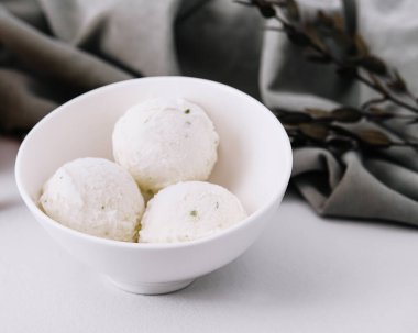 melon ice cream scoops in bowl