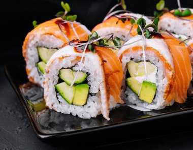 sushi rolls with salmon and eel